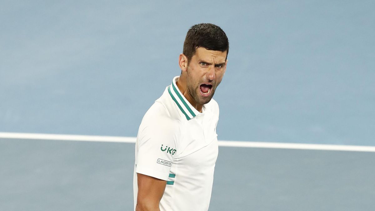 Novak Djokovic of Serbia reacts in his Men's Singles fourth round match against Milos Raonic of Canada during day seven of the 2021 Australian Open at Melbourne Park