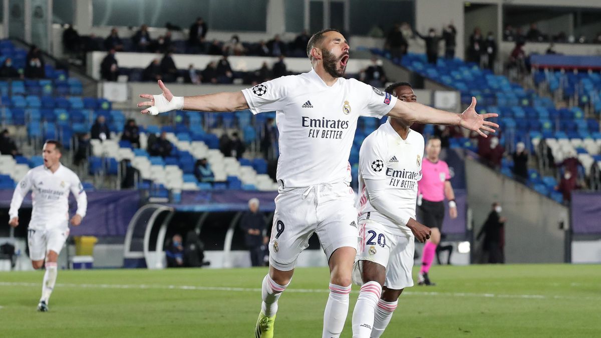 MADRID, SPAIN - MARCH 16: Karim Benzema of Real Madrid celebrates after scoring their side's first goal during the UEFA Champions League Round of 16 match between Real Madrid and Atalanta at Estadio Alfredo Di Stefano on March 16, 2021 in Madrid, Spain.