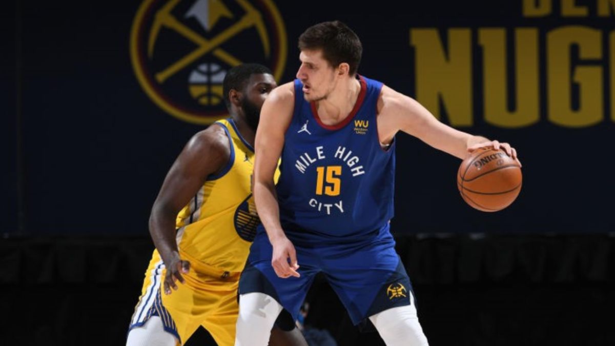 Nikola Jokic #15 of the Denver Nuggets dribbles the ball during the game against the Golden State Warriors on January 14, 2021