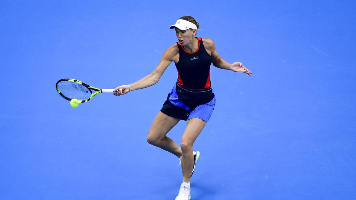 Caroline Wozniacki of Denmark hits a return against Anastasija Sevastova of Latvia during her Women's Singles Finals match in the 2018 China Open