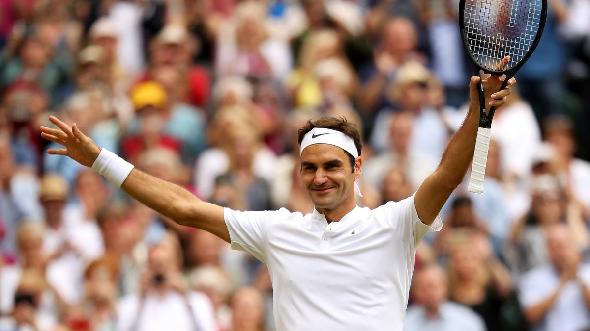 Federer celebrates after beating Berdych