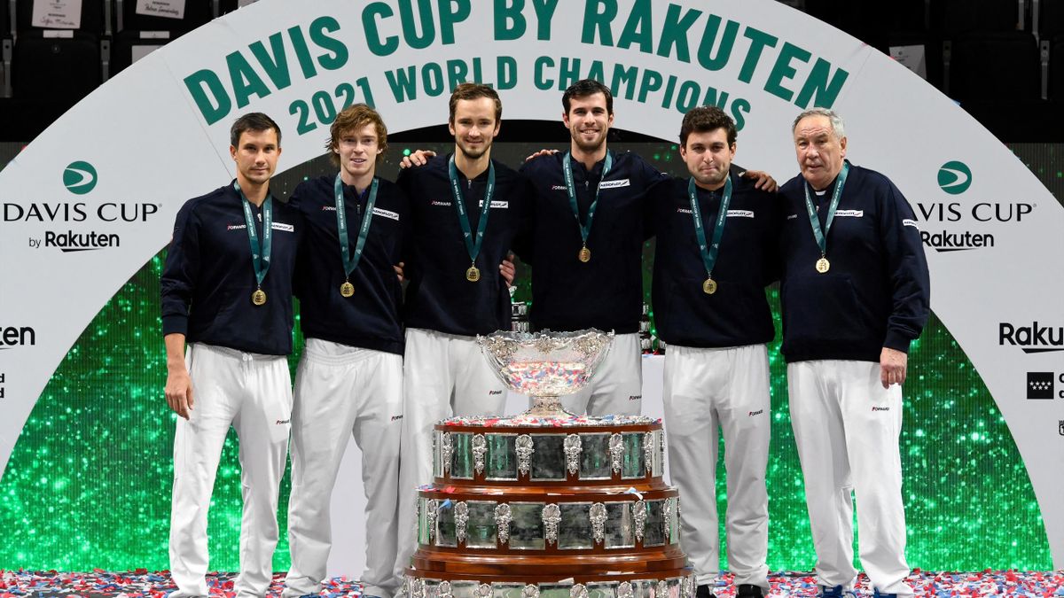 Russia's Evgeny Donskoy, Russia's Andrey Rublev, Russia's Daniil Medvedev, Russia's Karen Khachanov, Russia's Aslan Karatsev and Russia's Davis Cup captain Shamil Tarpischev pose for pictures with the trophy after winning the Davis Cup tennis tournament