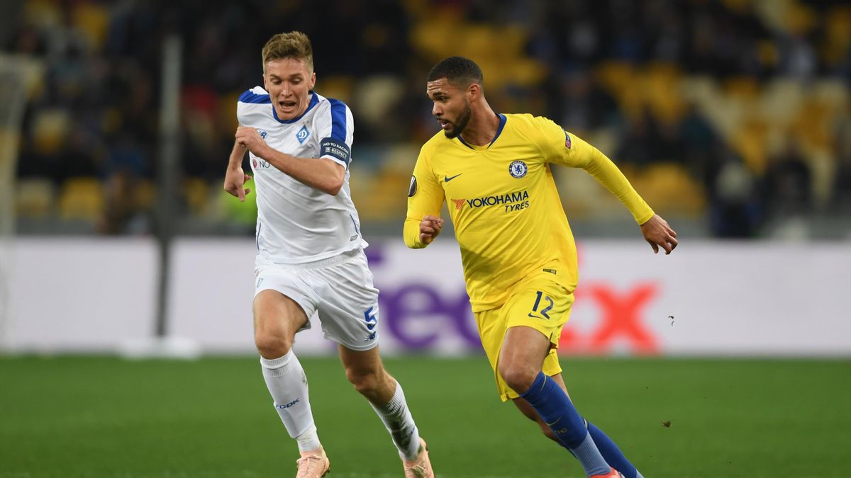 Ruben Loftus-Cheek of Chelsea runs with the ball under pressure from Serhiy Sydorchuk of Dynamo Kyiv during the UEFA Europa League Round of 16 Second Leg match between Dynamo Kyiv and Chelsea at NSC Olimpiyskiy Stadium on March 14, 2019 in Kiev, Ukraine.
