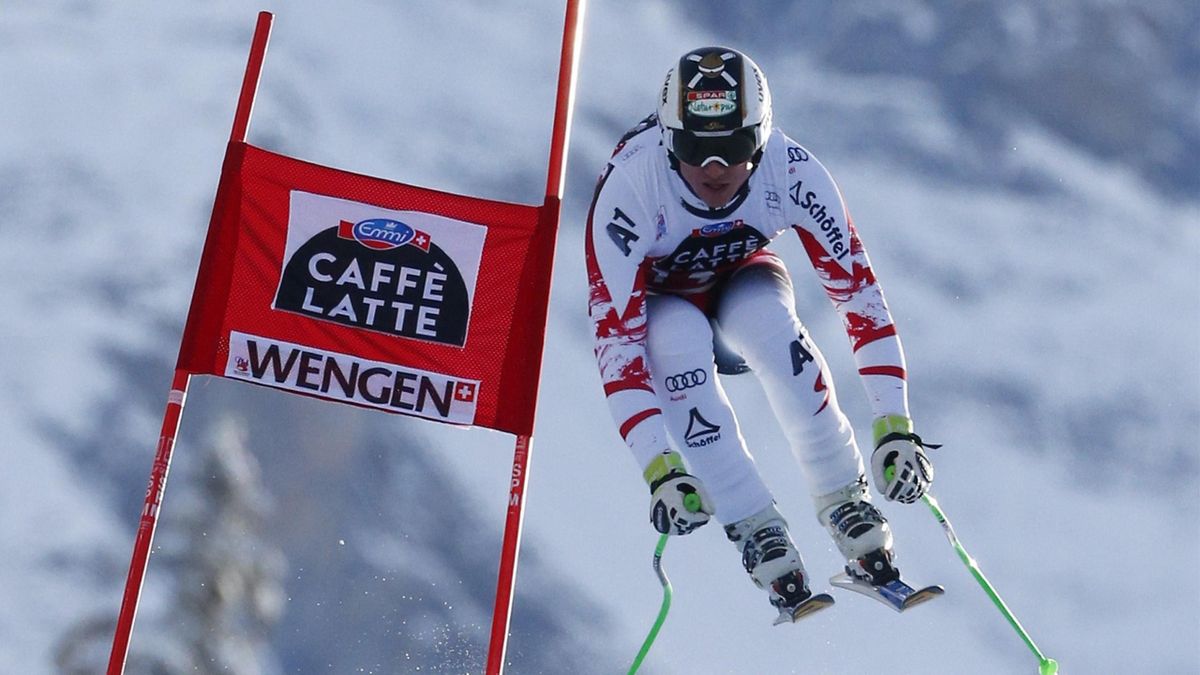 Hannes Reichelt of Austria jumps past a gate during the men's Alpine Skiing World Cup downhill race in Wengen (Reuters)