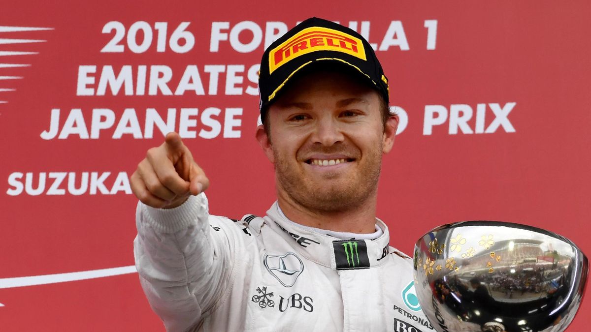 Mercedes AMG Petronas F1 Team's German driver Nico Rosberg holds the cup