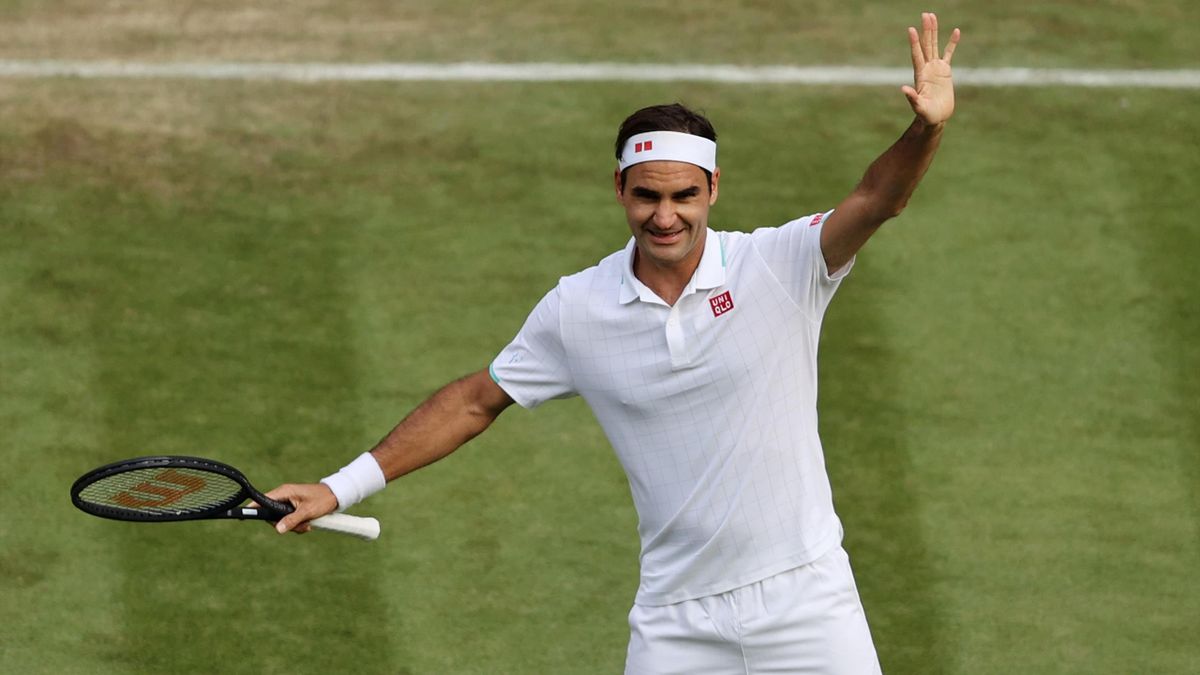 Roger Federer of Switzerland celebrates match point during his men's singles second round match against Richard Gasquet of France during Day Four of The Wimbledon Championships