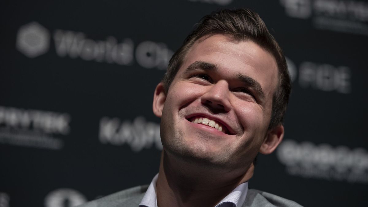 Norwegian Magnus Carlsen speaks to the media after beating his opponent, American Fabiano Caruana, and regain his World Chess Championship title, on November 28.