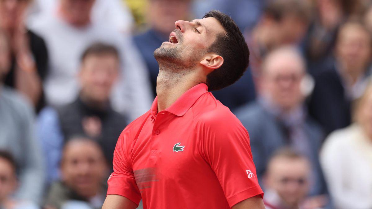 Novak Djokovic of Serbia reacts during his match against Diego Schwartzman of Argentina on Court Suzanne Lenglen during the singles fourth round match at the 2022 French Open