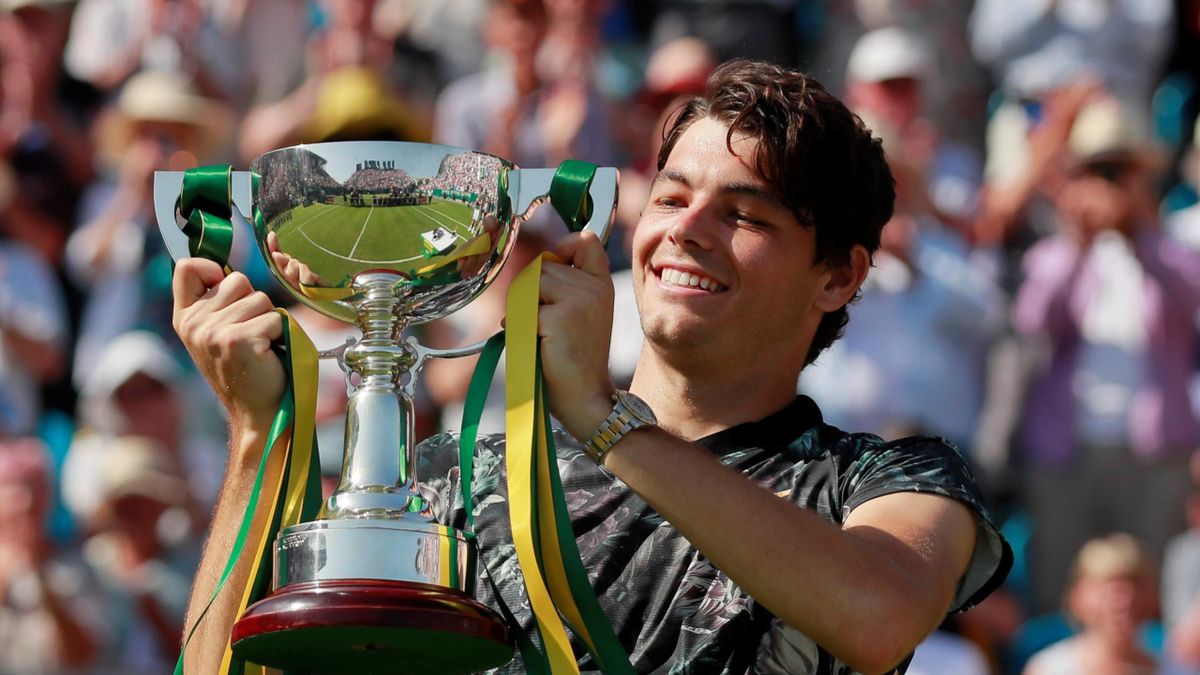 ATP 250 - Eastbourne International - Devonshire Park, Eastbourne, Britain - June 29, 2019 Taylor Fritz of the U.S. celebrates with the trophy after winning the final against Sam Querrey of the U.S