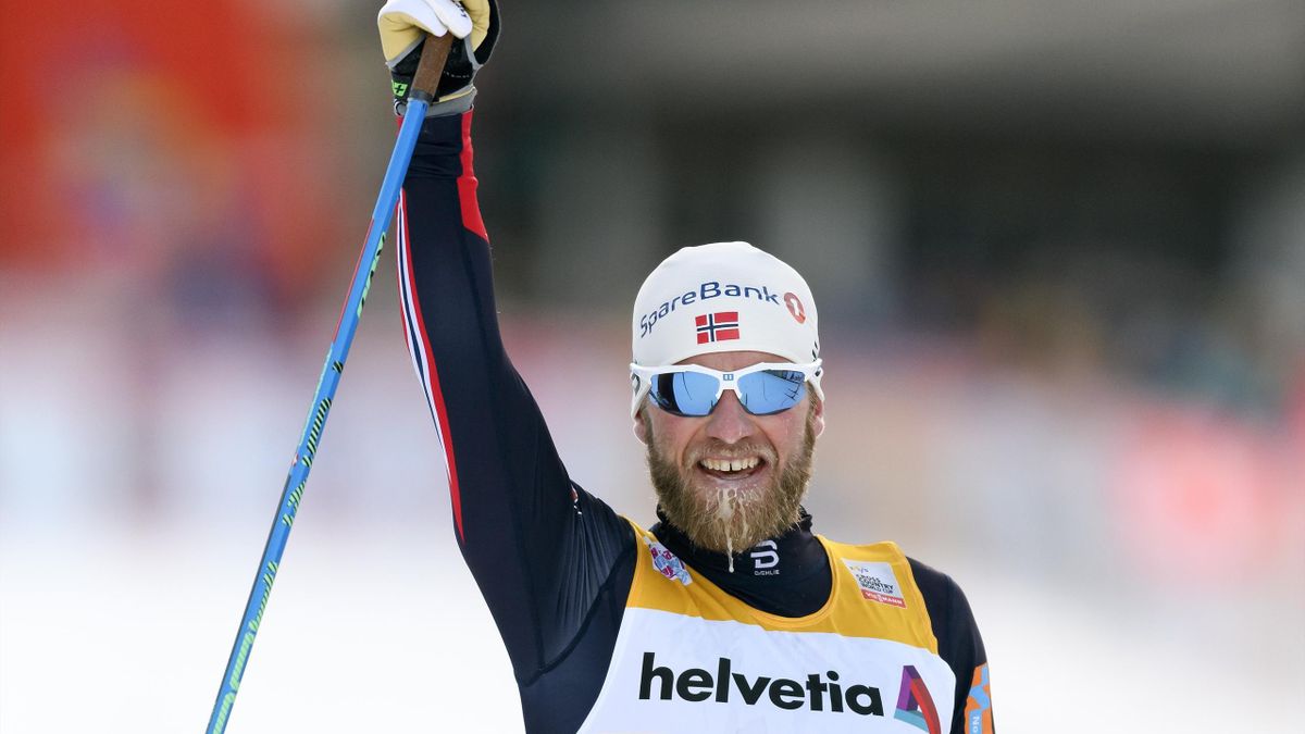 Norway's Martin Johnsrud Sundby celebrates his victory in the Men's 30km individual free race