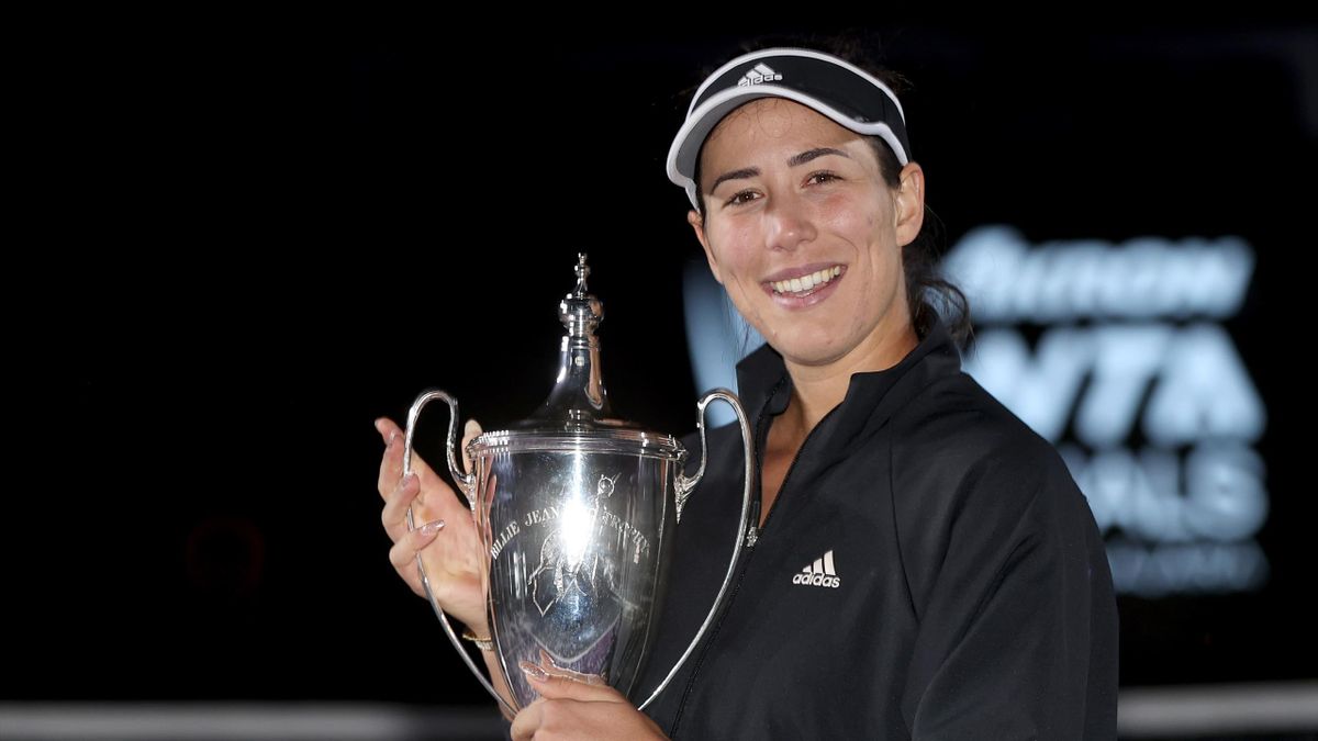 Garbiñe Muguruza of Spain poses with the Billie Jean King Trophy after defeating Anett Kontaveit of Estonia during the Women's Singles Final on Day 8 of 2021 Akron WTA Finals Guadalajara
