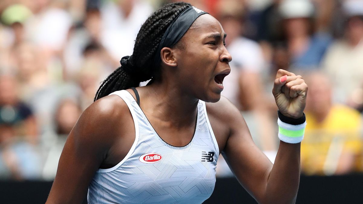 Coco Gauff of the United States celebrates after winning match point during her Women's Singles second round match against Sorana Cirstea of Romania on day three of the 2020 Australian Open at Melbourne Park on January 22, 2020