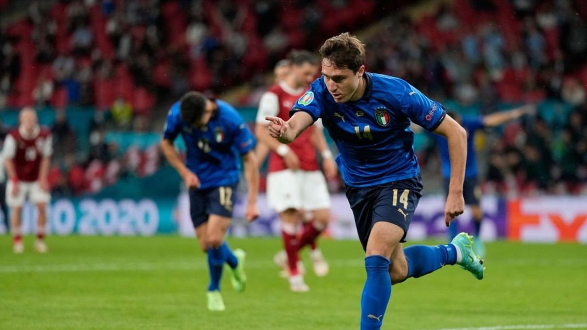 Italy's midfielder Federico Chiesa celebrates after scoring the opening goal during the UEFA EURO 2020 round of 16 football match between Italy and Austria at Wembley Stadium in London on June 26, 2021. (Photo by Frank Augstein / POOL / AFP) (Photo by FRA