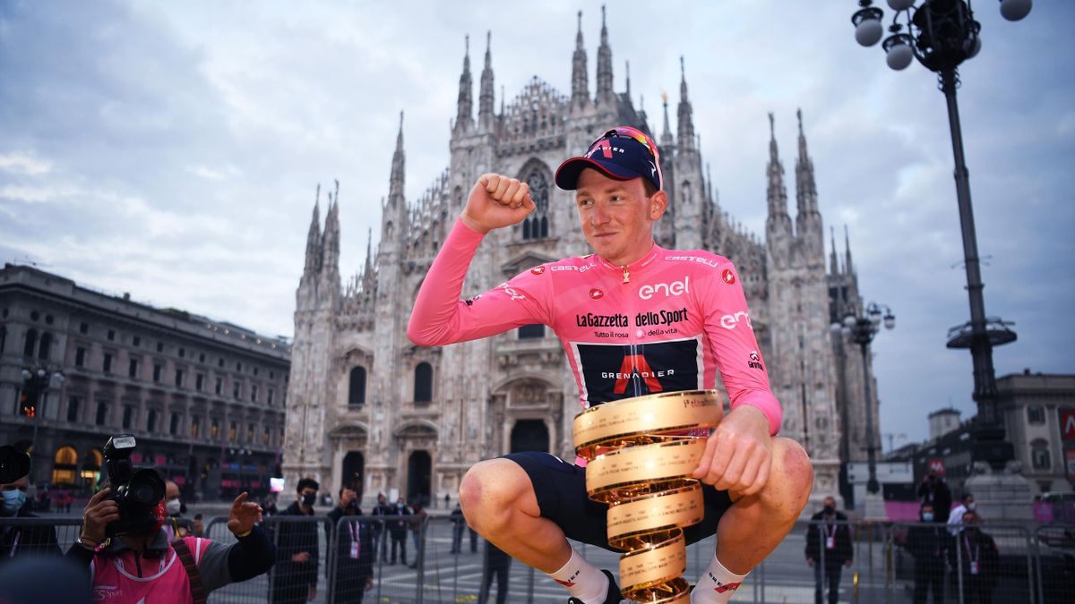 Geoghegan Hart celebrates with his Giro d'Italia trophy in 2020