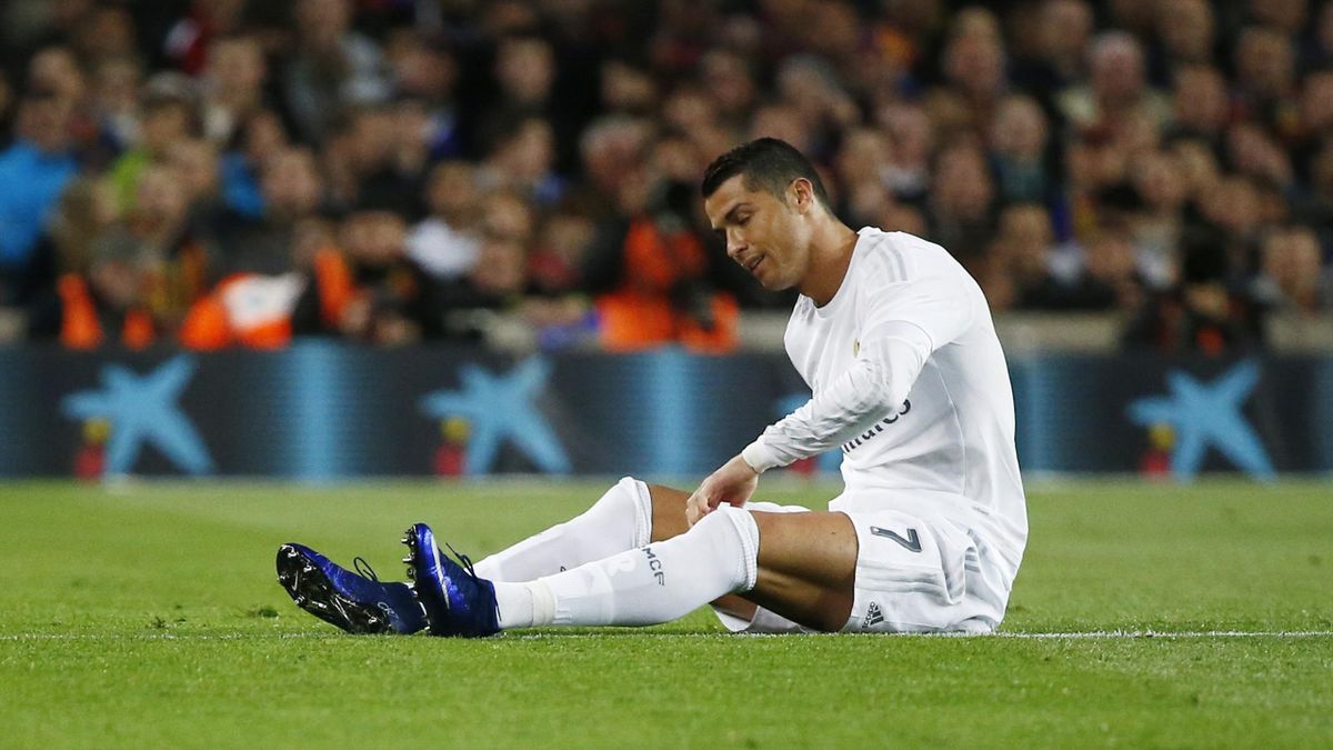 Real Madrid's Cristiano Ronaldo sits on the pitch