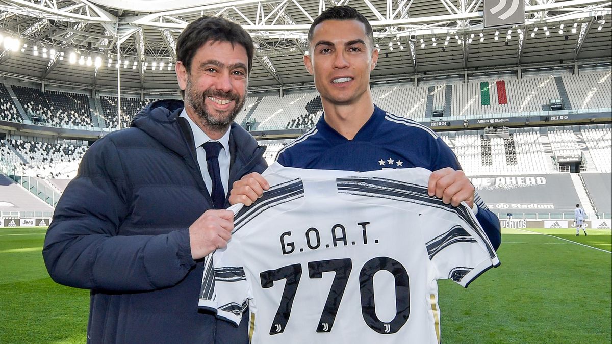 Cristiano Ronaldo was presented with a GOAT” shirt by Juventus president Andrea Agnelli