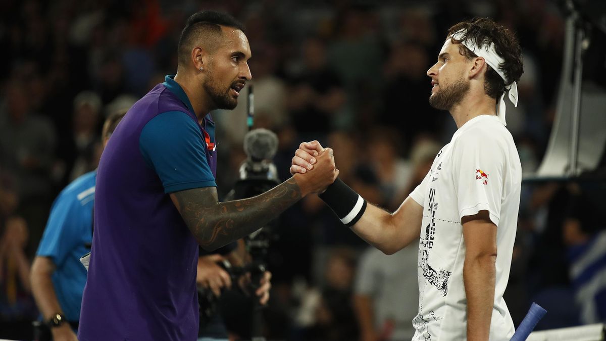 Dominic Thiem of Austria (R) shakes hands with Nick Kyrgios of Australia after their Men's Singles third round match during day five of the 2021 Australian Open at Melbourne Park
