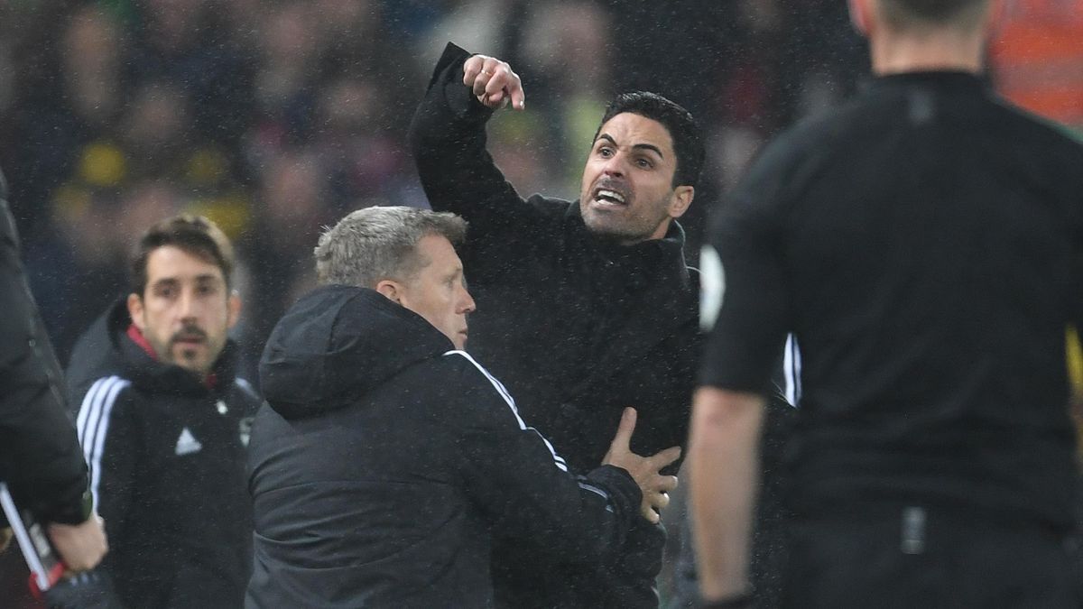 Arsenal manager Mikel Arteta clashes with Liverpool manager Jurgen Klopp during the Premier League match between Liverpool and Arsenal at Anfield on November 20, 2021 in Liverpool, England.