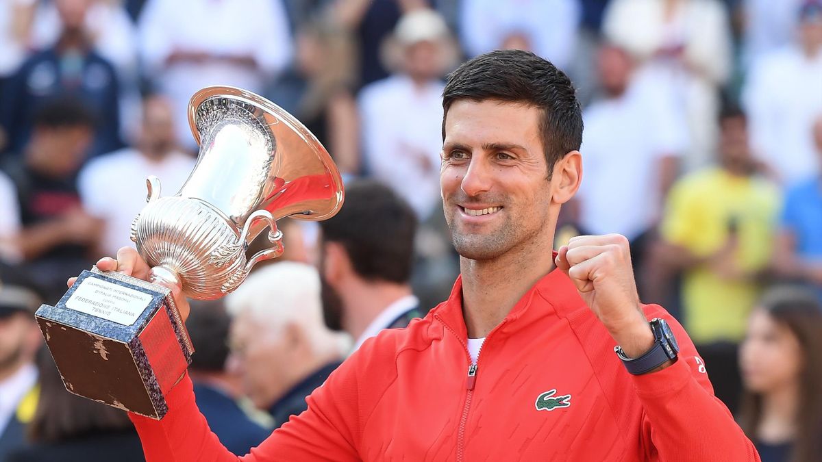 Novak Djokovic of Serbia celebrates with the Internazionali BNL D'Italia Men's Single's winners trophy after their victory against Stefanos Tsitsipas of Greece during the Men's Single's Final on Day 8 of the Internazionali BNL D'Italia at Foro Italico
