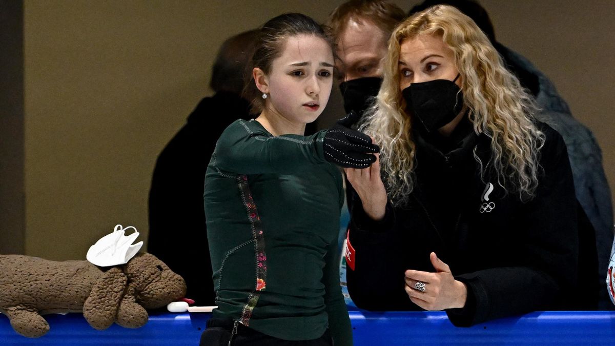 Russia's Kamila Valieva and her coach Eteri Tutberidze (R) attend a training session on February 11, 2022 prior the Figure Skating Event at the Beijing 2022 Olympic Games.