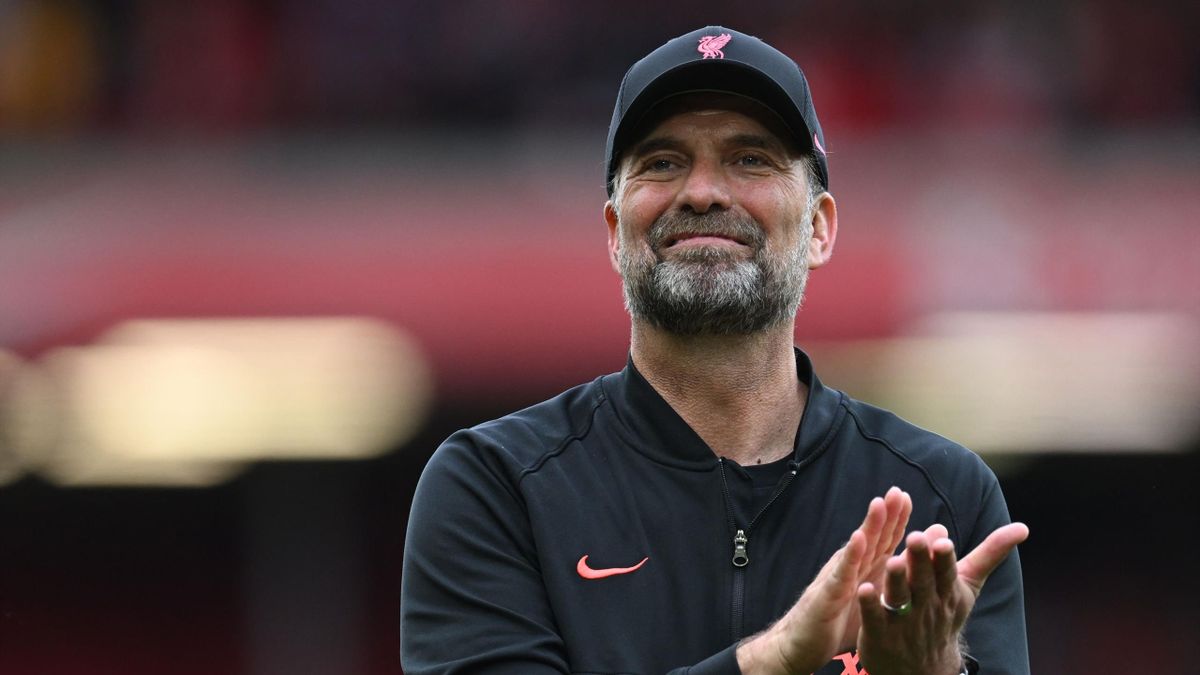 Liverpool's German manager Jurgen Klopp applauds during a lap of honour at the end of the English Premier League football match between Liverpool and Wolverhampton Wanderers at Anfield in Liverpool, north west England on May 22, 2022.
