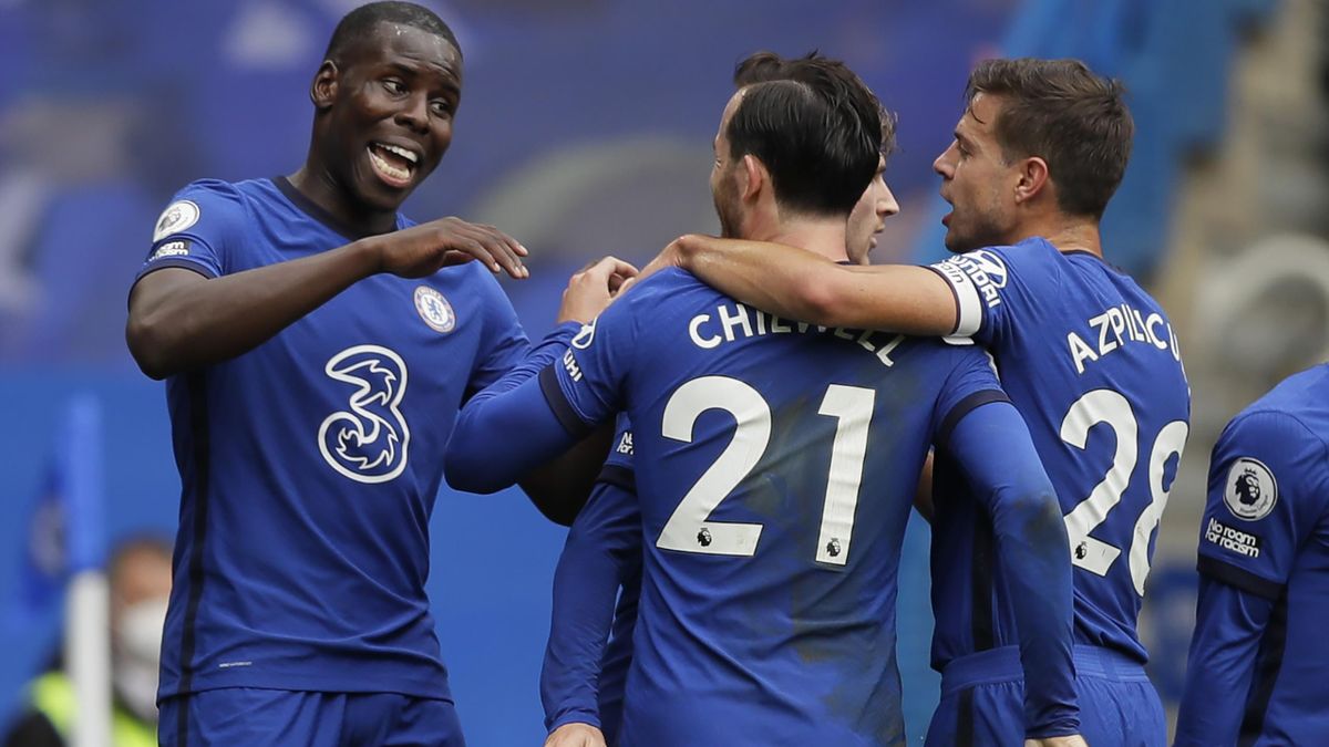 Chelsea's French defender Kurt Zouma (L) celebrates with teammates after he scores his team's second goal during the English Premier League football match between Chelsea and Crystal Palace at Stamford Bridge in London on October 3, 2020