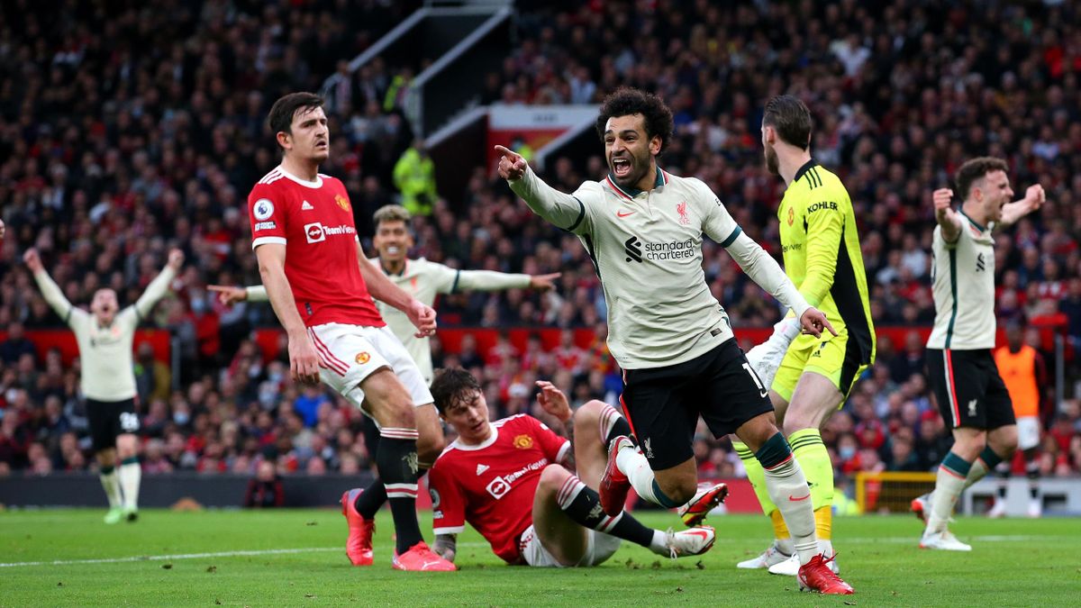 Mohamed Salah of Liverpool celebrates scoring his teams third goal during the Premier League match between Manchester United and Liverpool at Old Trafford on October 24, 2021 in Manchester, England