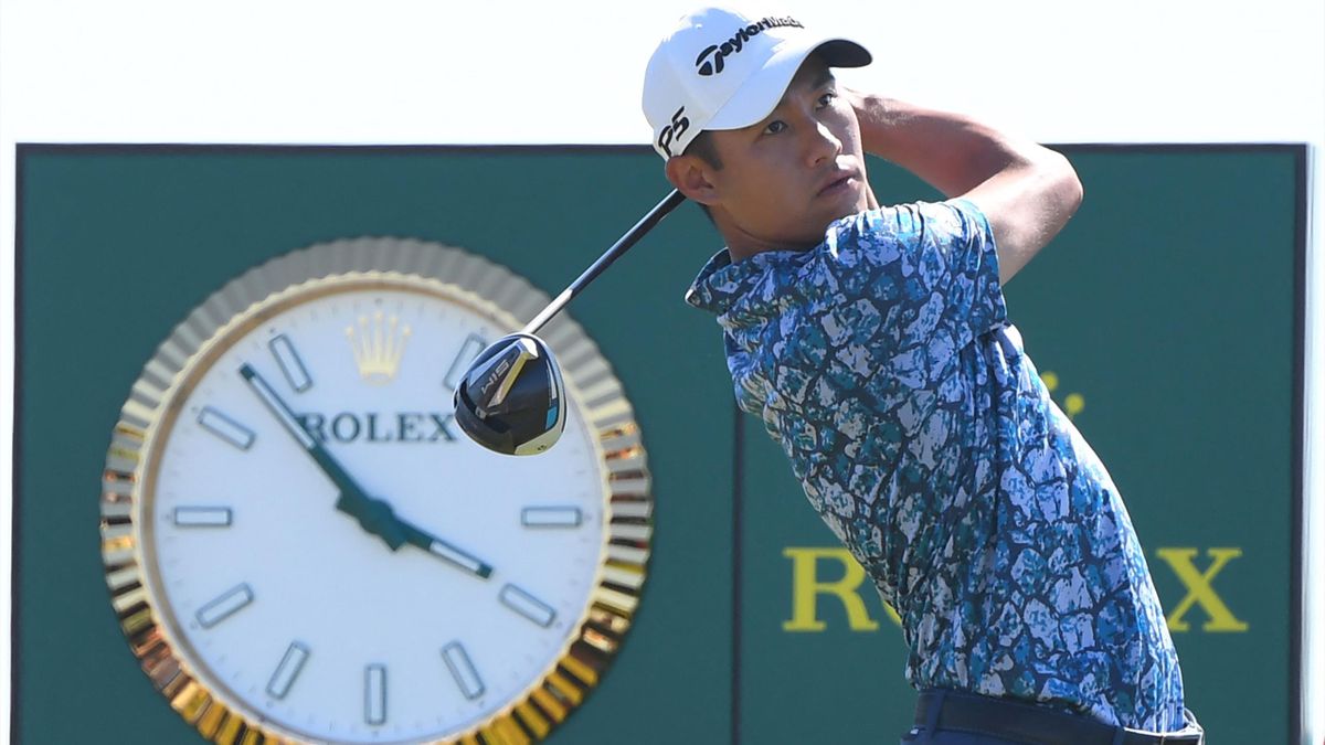 Collin Morikawa tees off during his final round on day 4 of The 149th British Open Golf Championship at Royal St George's, Sandwich in south-east England on July 18, 2021.