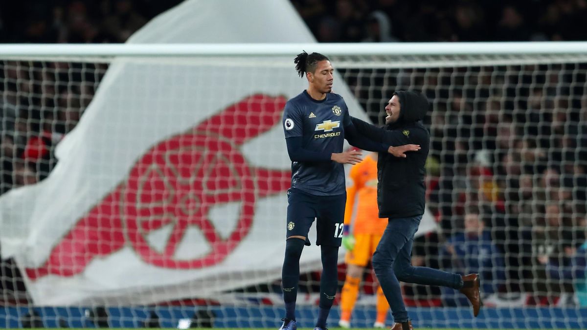 Football News Pitch Invader Shoves Smalling During Arsenal Goal Celebrations Eurosport