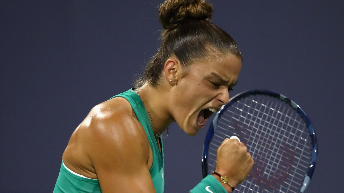 Maria Sakkari of Greece reacts after winning a point in her match against Danielle Collins of the United States