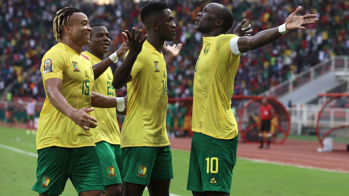 Cameroon's forward Vincent Aboubakar (R) celebrates scoring his team's first goal during the Group A Africa Cup of Nations (CAN) 2021 football match between Cape Verde and Cameroon at Stade d'Olembe in Yaounde on January 17, 2022.