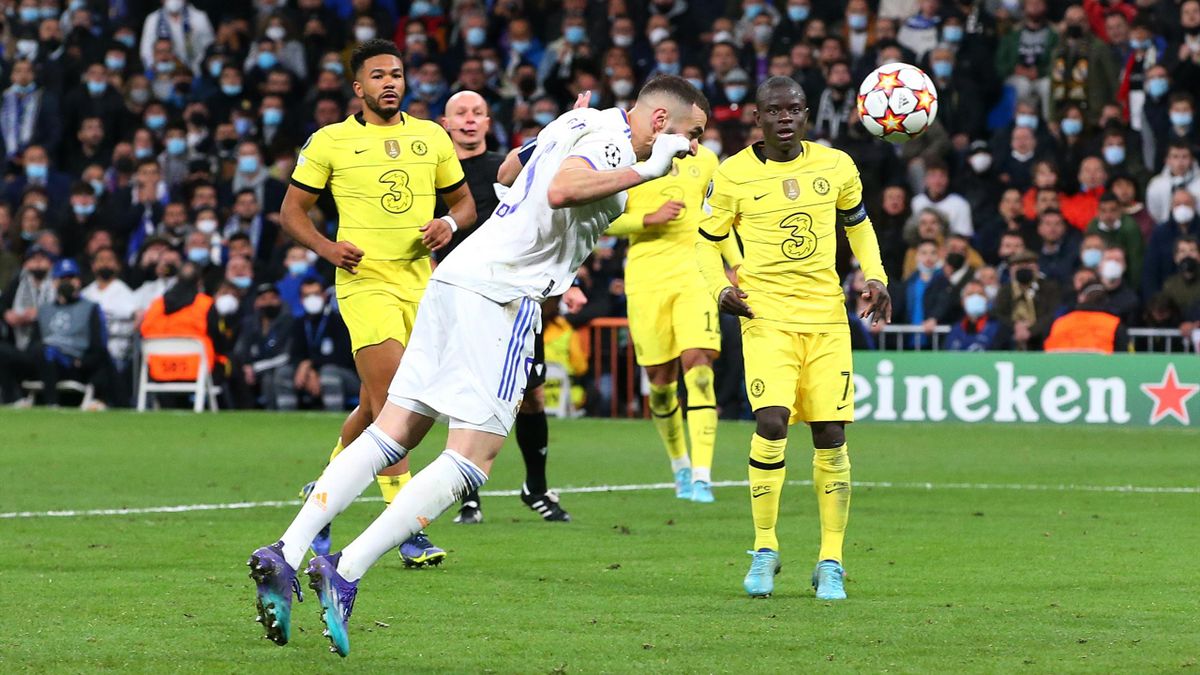 Karim Benzema of Real Madrid scores their second goal during the UEFA Champions League Quarter Final Leg Two match between Real Madrid and Chelsea
