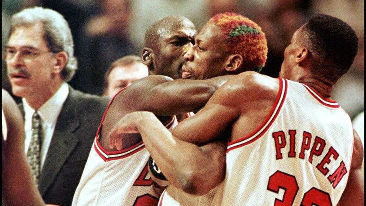 Michael Jordan (left) and Scottie Pippen (right) keep Dennis Rodman away from the Los Angeles Lakers' Shaquille O'Neal after O'Neal pushed Rodman after a timeout was called in the fourth quarter of the 17 December game at the United Center at Chicago 1996