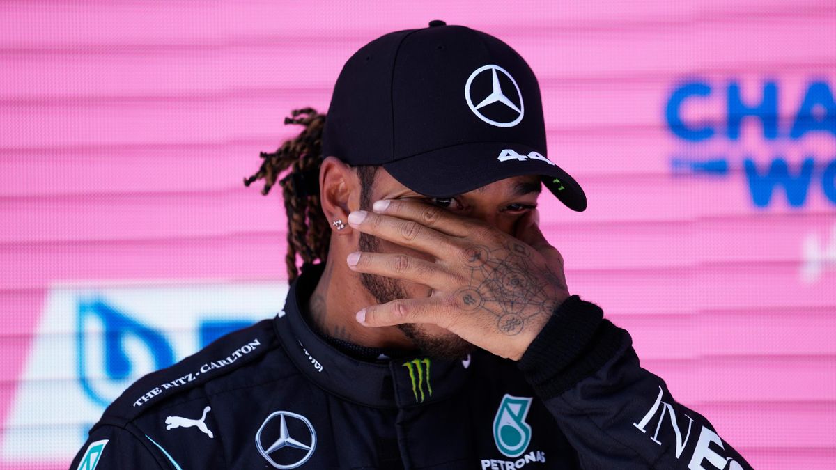Third place qualifier Lewis Hamilton of Great Britain and Mercedes GP looks on from parc ferme during qualifying ahead of the F1 Grand Prix of Styria at Red Bull Ring on June 26, 2021 in Spielberg, Austria.