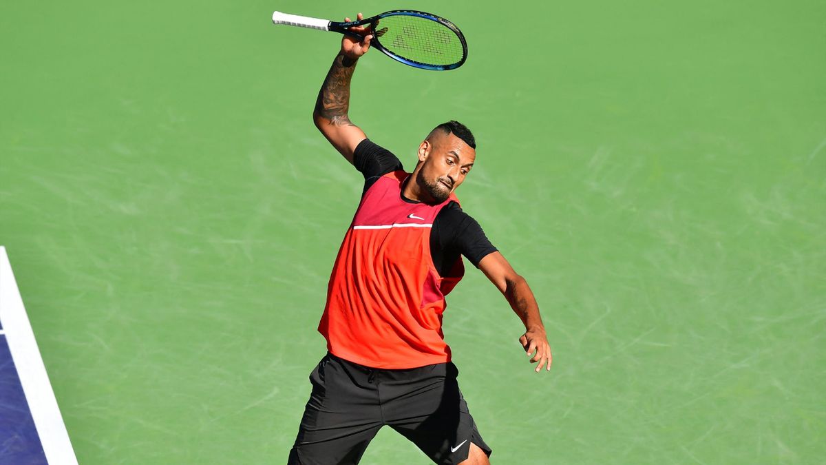 Nick Kyrgios breaks a racket after a lost point to Rafael Nadal of Spain in their ATP quarterfinal match at Indian Wells