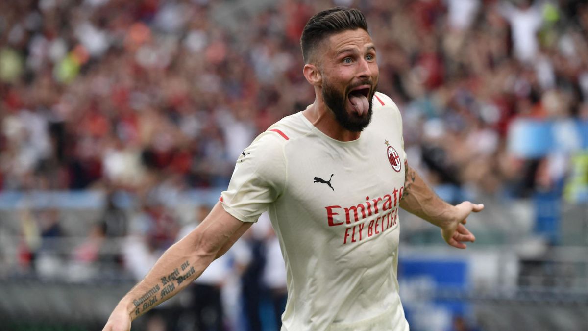 AC Milan's French forward Olivier Giroud celebrates after scoring his second goal during the Italian Serie A football match between Sassuolo and AC Milan on May 22, 2022 at the Mapei - Citta del Tricolore stadium in Sassuolo.