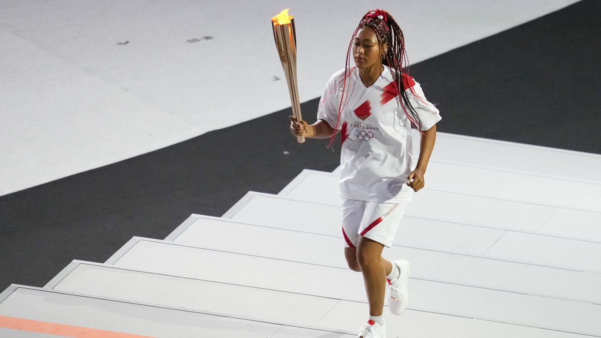 Naomi Osaka with the Olympic torch