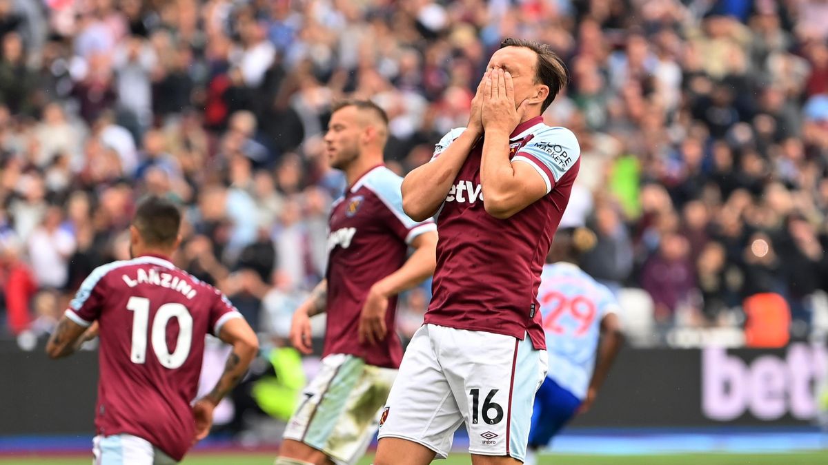 Mark Noble looks distraught
