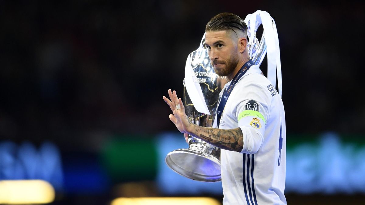 Sergio Ramos of Real Madrid celebrates with The Champions League trophy after the UEFA Champions League Final between Juventus and Real Madrid at National Stadium of Wales on June 3, 2017 in Cardiff, Wales.