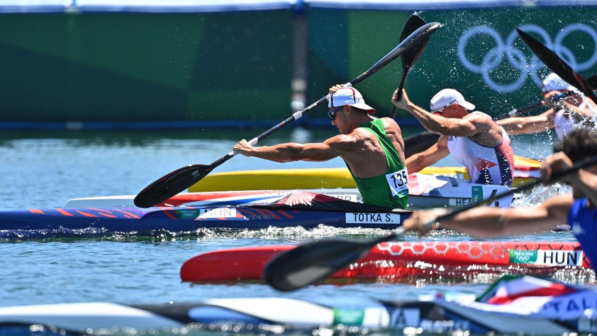 Hungary's Sandor Totka (L) competes to win gold in the men's kayak single 200m final during the Tokyo 2020 Olympic Games at Sea Forest Waterway in Tokyo on August 5, 2021. (Photo by Philip FONG / AFP) (Photo by PHILIP FONG/AFP via Getty Images)