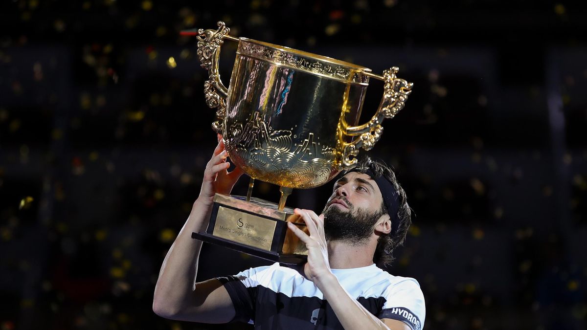 Nikoloz Basilashvili of Georgia holds the winner's trophy after winning his Men's Singles Finals match against Juan Martin Del Potro of Argentina in the 2018 China Open at the China National Tennis Center on October 7, 2018 in Beijing, China.