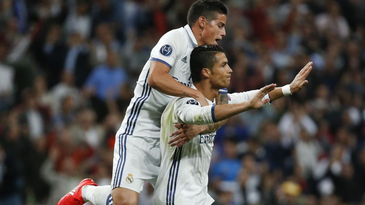 Real Madrid's Cristiano Ronaldo celebrates goal with team mate James Rodriguez.
