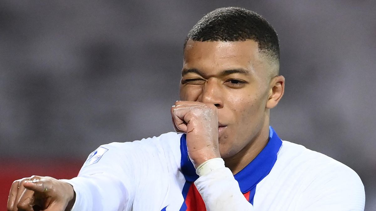 Paris Saint-Germain's French forward Kylian Mbappe celebrates after scoring a goal during the French L1 football match between Brest and Paris Saint-Germain at the Stade Francis-Le Ble stadium, in Brest, western France, on May 23, 2021