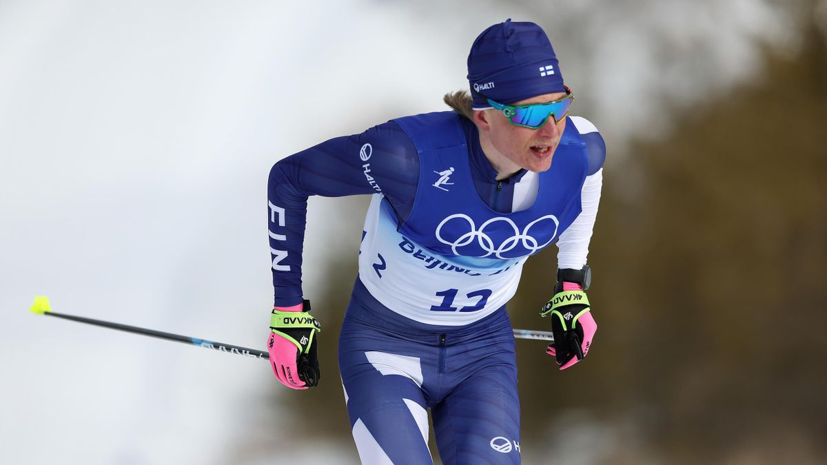 Remi Lindholm of Team Finland competes during the Men's Cross-Country Skiing at the Beijing Winter Olympics.