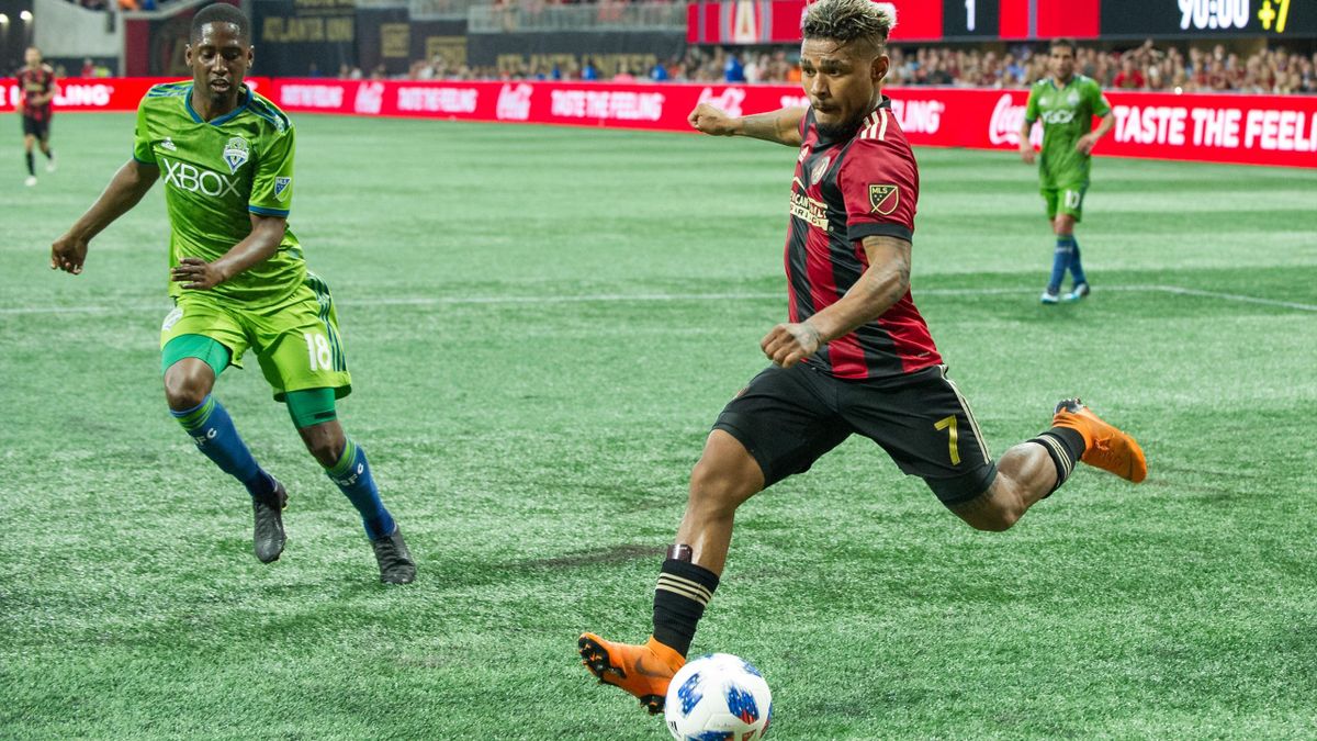 Josef Martinez #7 of Atlanta United takes a shot in front of Kelvin Leerdam #18 of Seattle Sounders FC 2 during the game at Mercedes-Benz Stadium