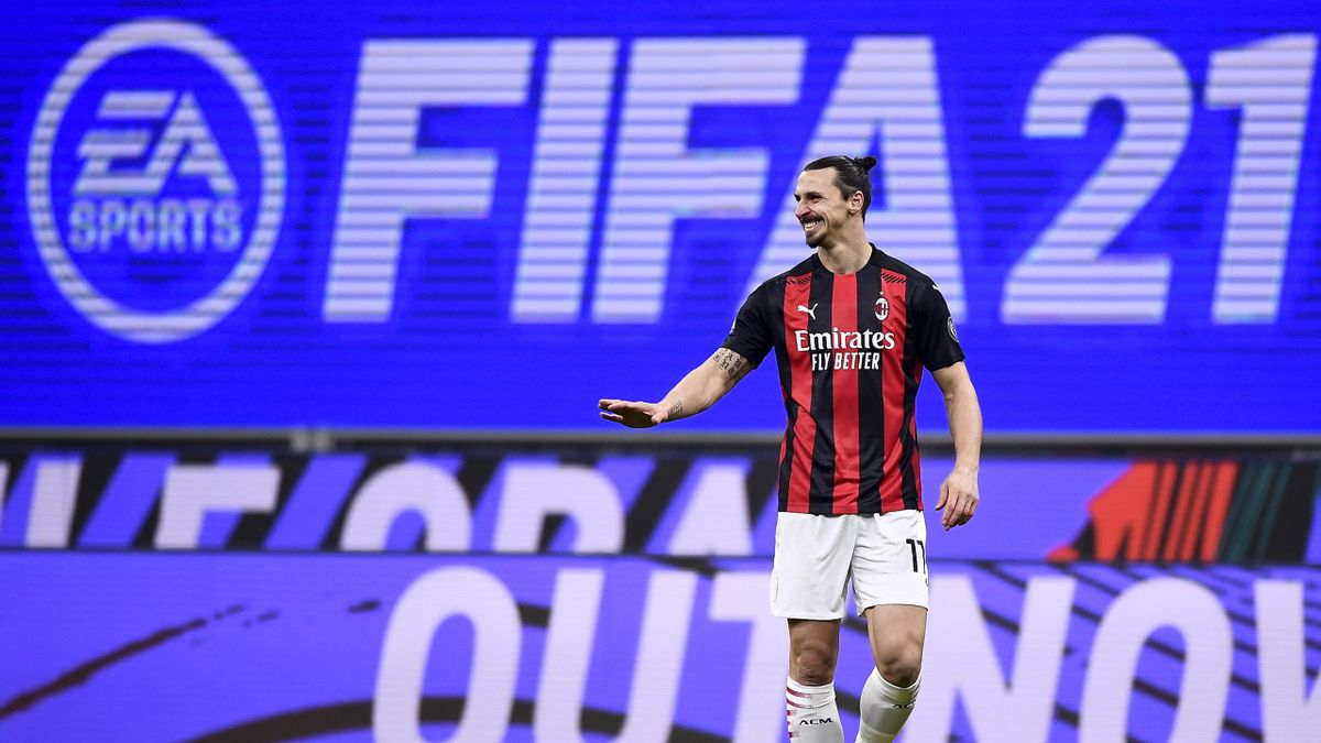 Zlatan Ibrahimovic of AC Milan reacts in front of a EA Sports FIFA 21 video game billboard advertising during the Serie A football match between AC Milan and Torino FC
