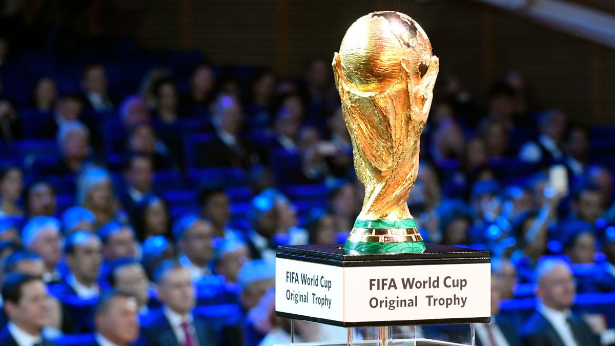 The FIFA World Cup trophy is displayed on stage ahead of the 2018 FIFA World Cup football tournament final draw at the State Kremlin Palace in Moscow