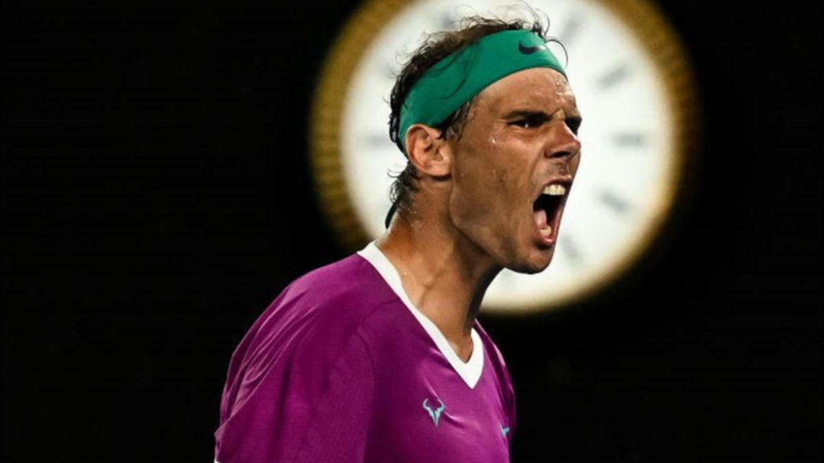 Rafael Nadal of Spain celebrates against Daniil Medvedev of Russia in the final of the men’s singles during day 14 of the 2022 Australian Open at Melbourne Park on January 30, 2022 in Melbourne