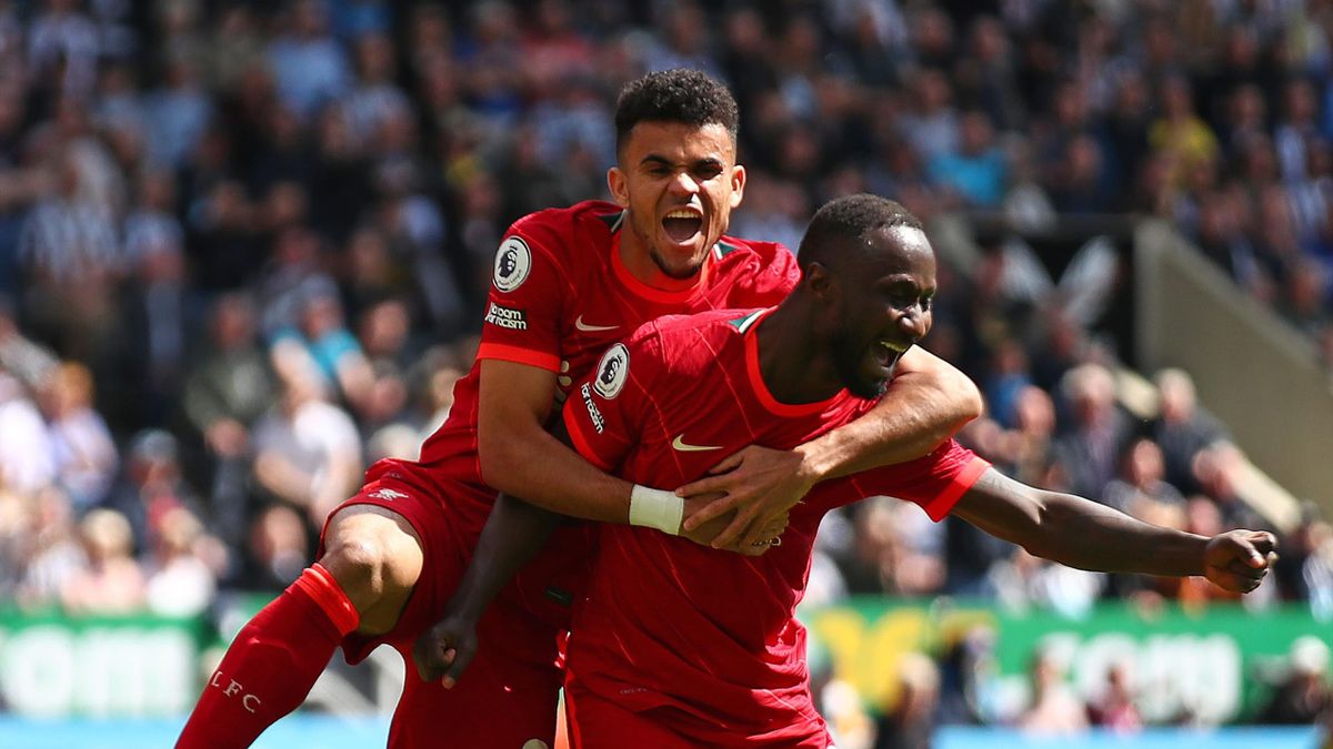 Naby Keita of Liverpool celebrates scoring the opening goal with team-mate Luis Diaz during the Premier League match between Newcastle United and Liverpool at St. James' Park