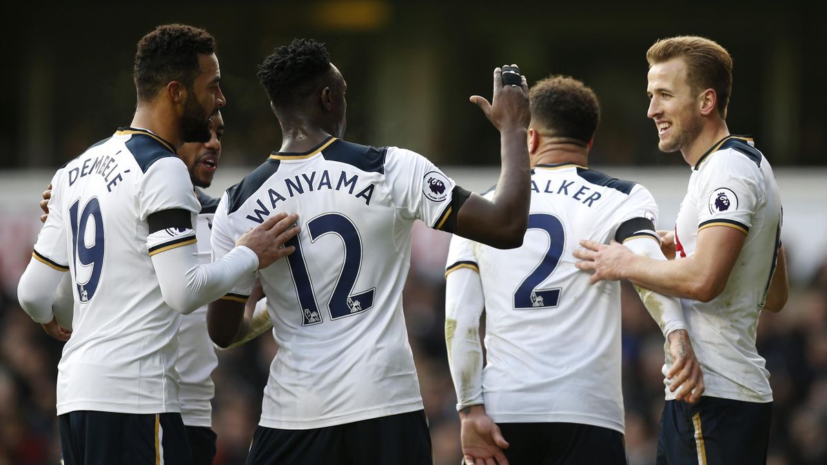 Tottenham players celebrate beating West Brom